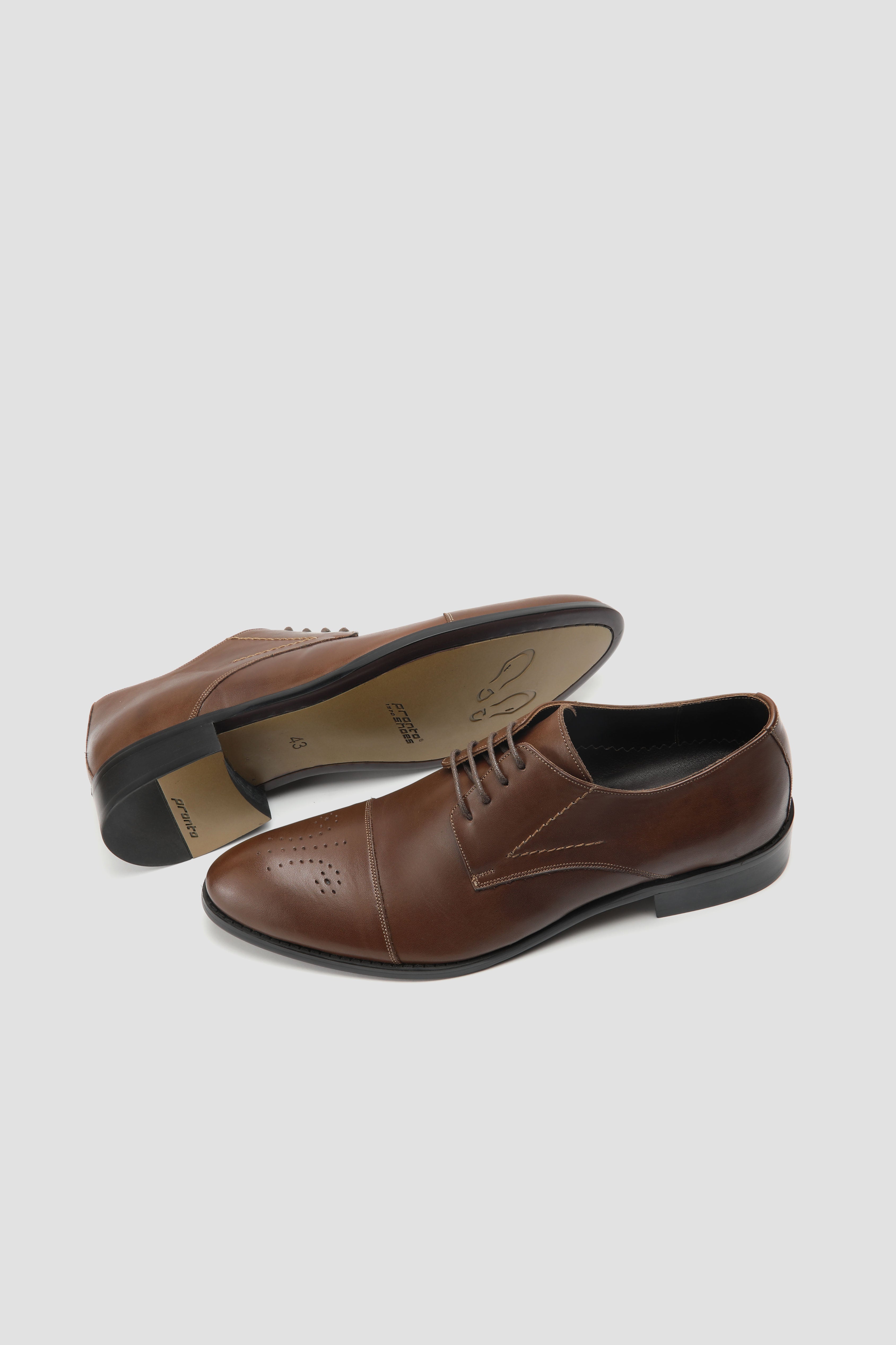 Cap toe derby